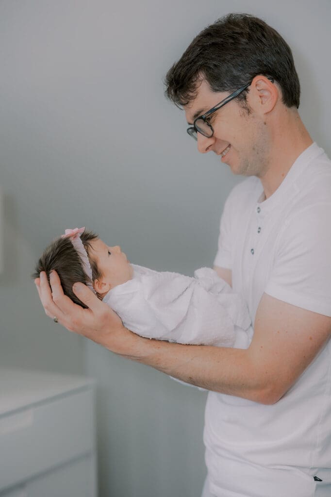 Newborn photography session in Richmond featuring the Jernigan family and their baby girl with her amazing head of hair.