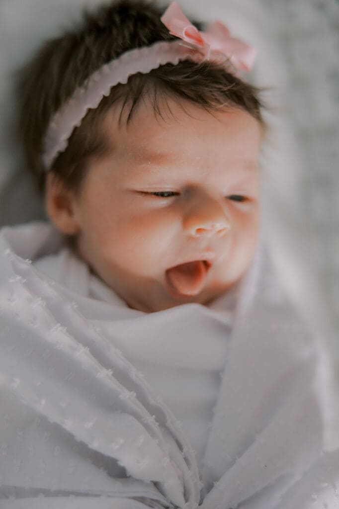 Newborn photography session in Richmond featuring the Jernigan family and their baby girl with her amazing head of hair.