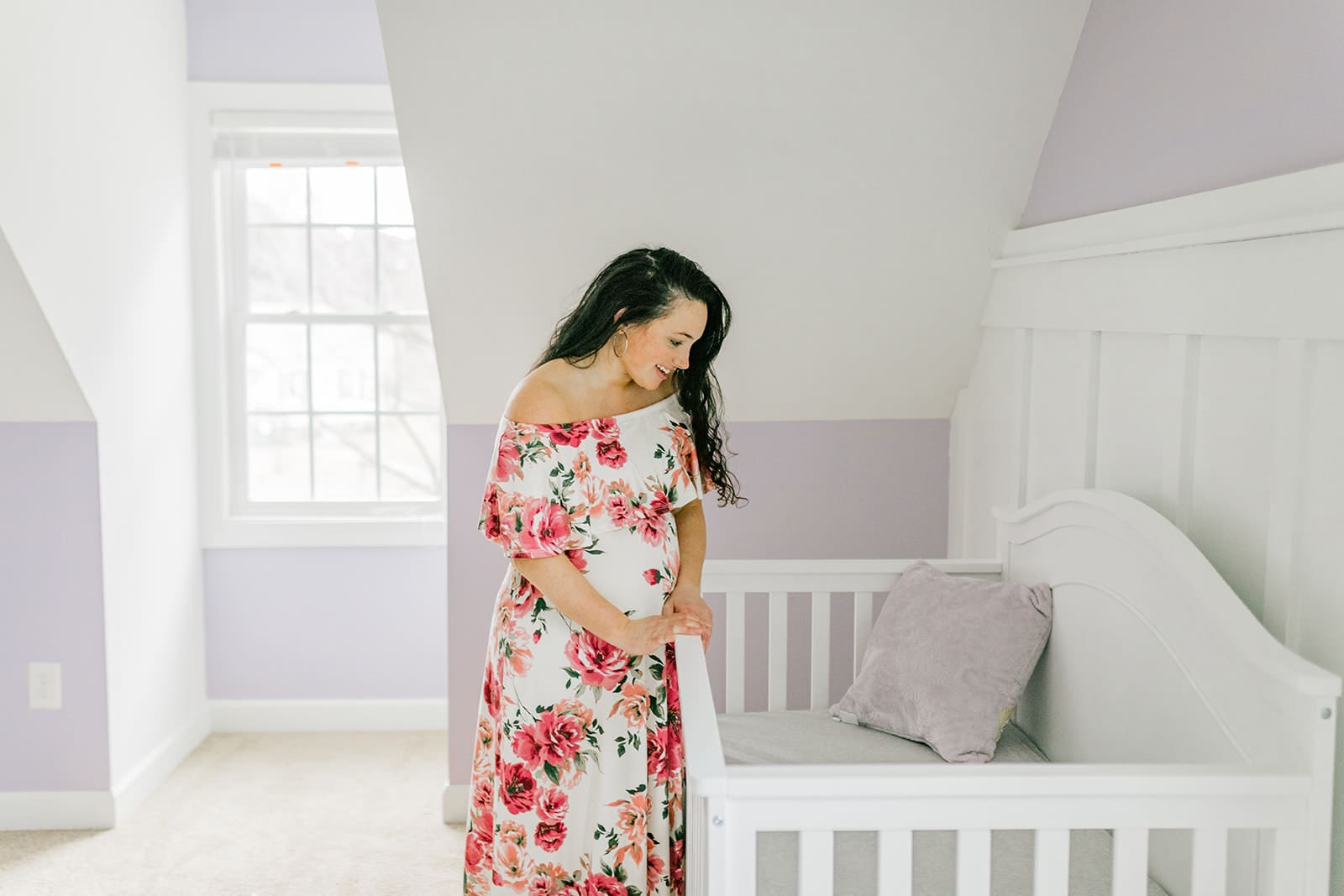 March maternity session in Williamsburg featuring the Sabo family in their cozy home and baby's nursery.