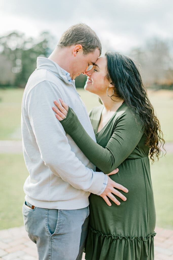 March maternity session in Williamsburg featuring the Sabo family in their cozy home and baby's nursery.