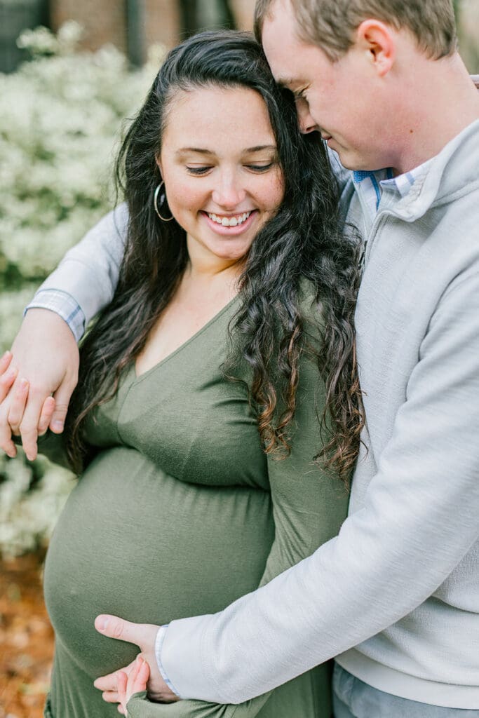 March maternity session in Williamsburg featuring the Sabo family in their cozy home and baby's nursery.