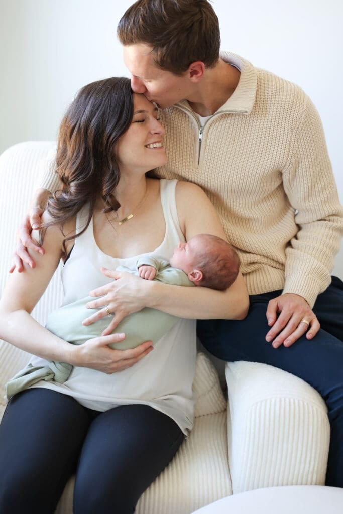 Richmond newborn photographer session featuring baby Cooper and his family in their sunlit Rockville home with their dog Riley