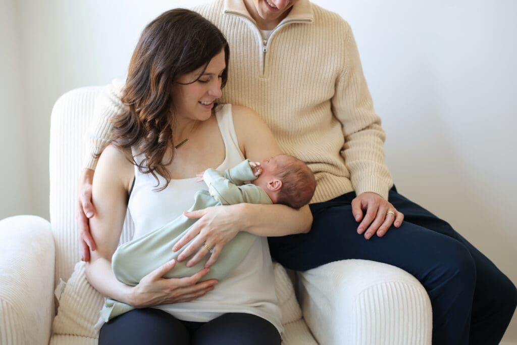 Richmond newborn photographer session featuring baby Cooper and his family in their sunlit Rockville home with their dog Riley